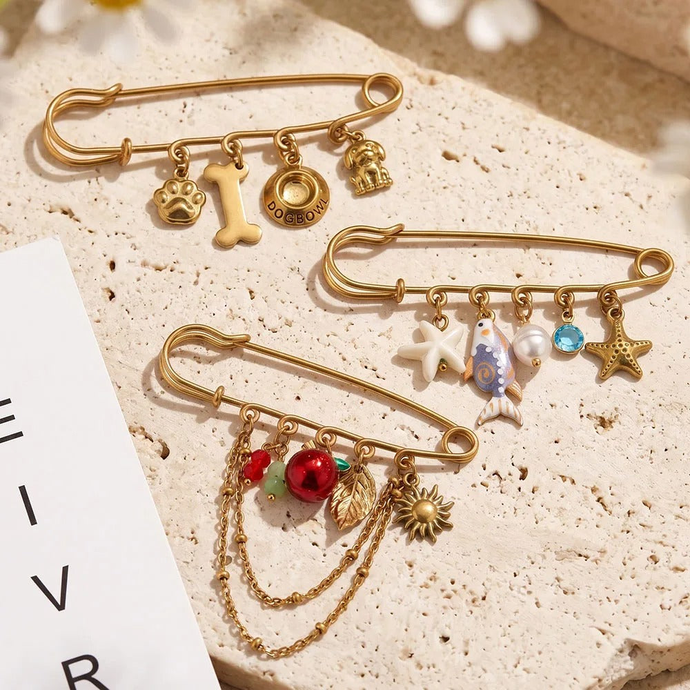 Charmed safety pins